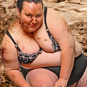 Mud Wrestling Roly Poly Stripper